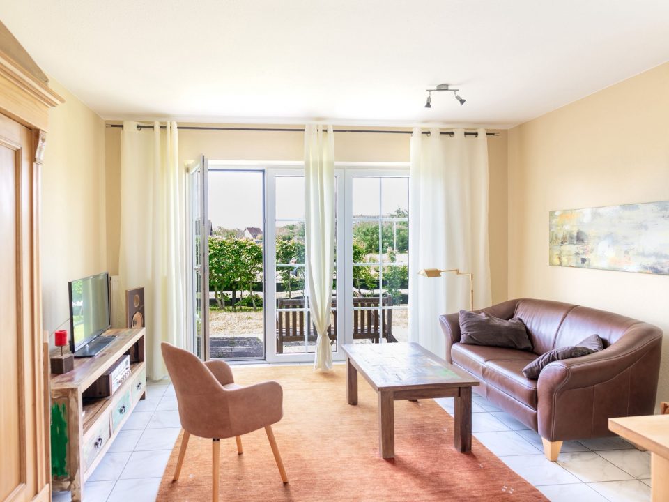 Helles Wohnzimmer im Ferienhaus Huus Marie Wellenrauschen in Friedrichskoog-Spitze